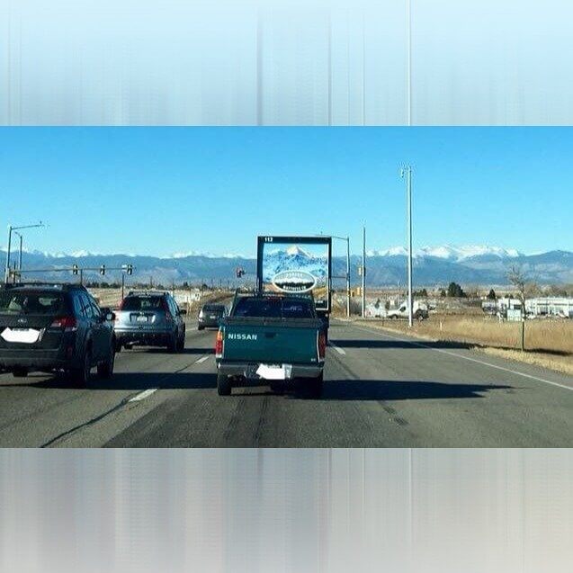The Photo On The Truck Lines Up With The Mountains